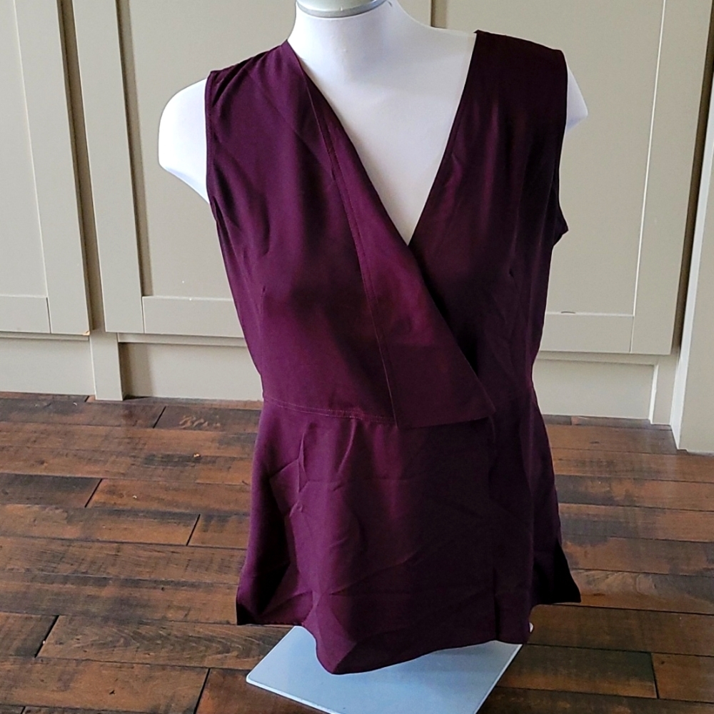 DKNY burgundy wrap peplum top. Size medium.